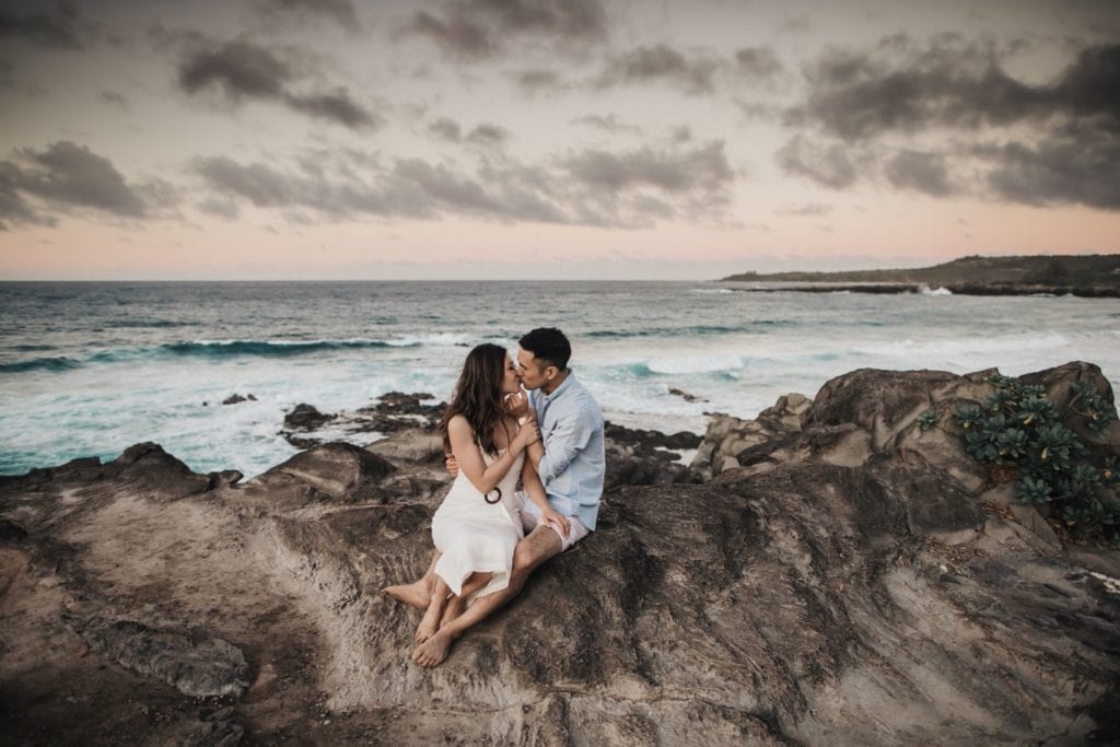 Maui Engagement Photography couple kissing on the cliffs