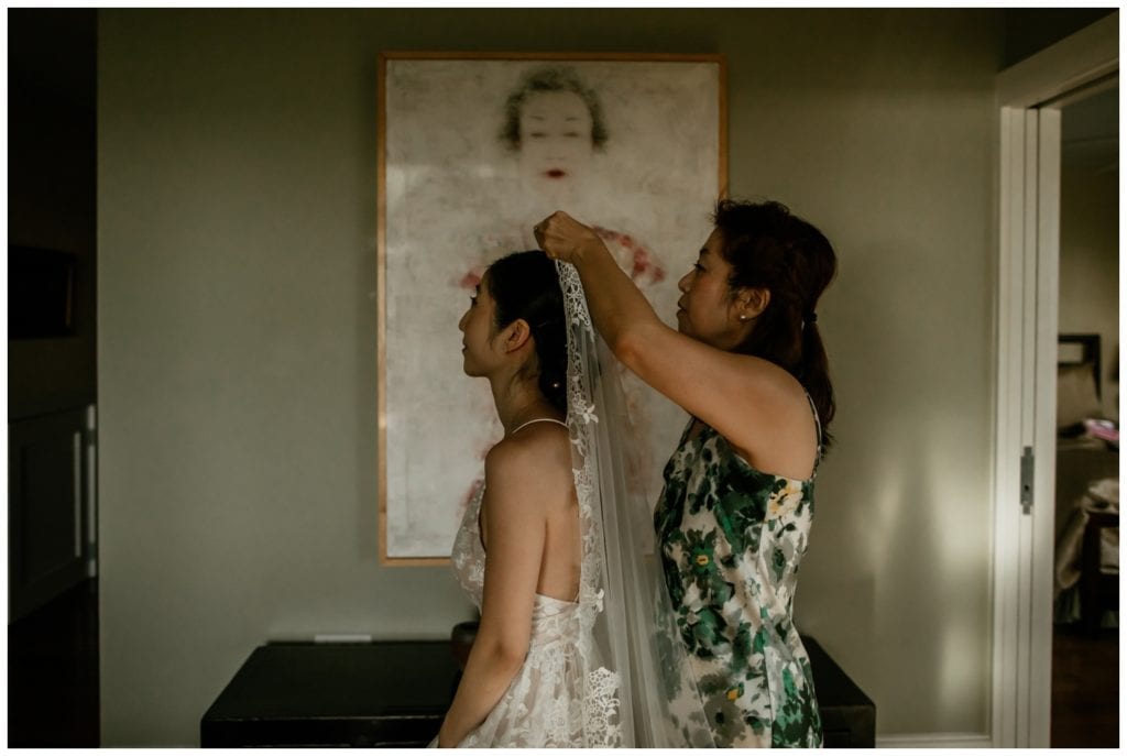 Olowalu Wedding Elopement Photographer picture of bride getting ready with mother at rental house