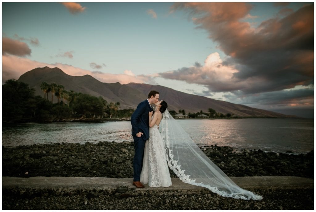 Olowalu Wedding Elopement Photographer picture of bride and groom on their wedding day walking 