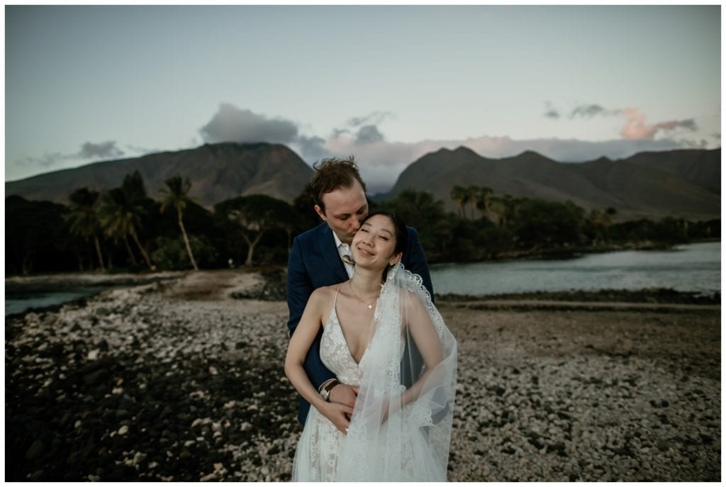 Olowalu Wedding Elopement Photographer picture of bride and groom on their wedding day kissing