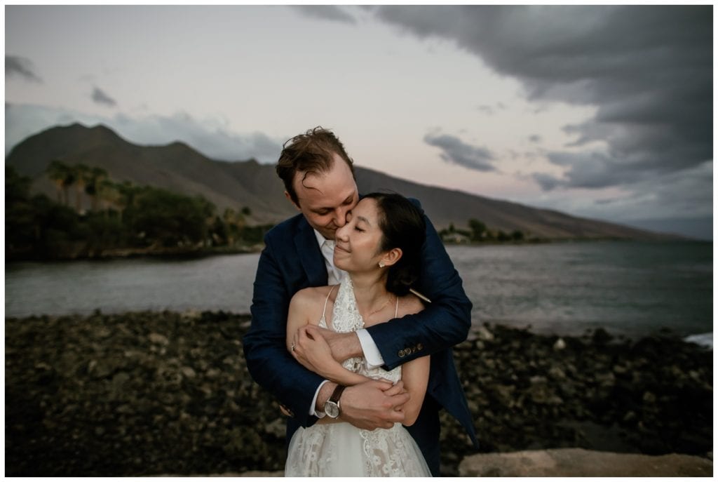 Olowalu Wedding Elopement Photographer picture of bride and groom on their wedding day embracing