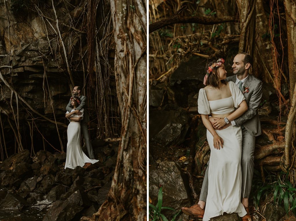 Groom holding Bride in wet forest area