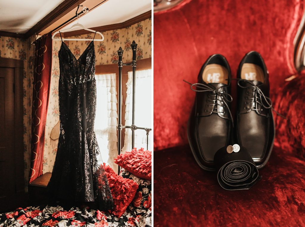 Detail shot of black elopement dress hanging and Groom's shoes