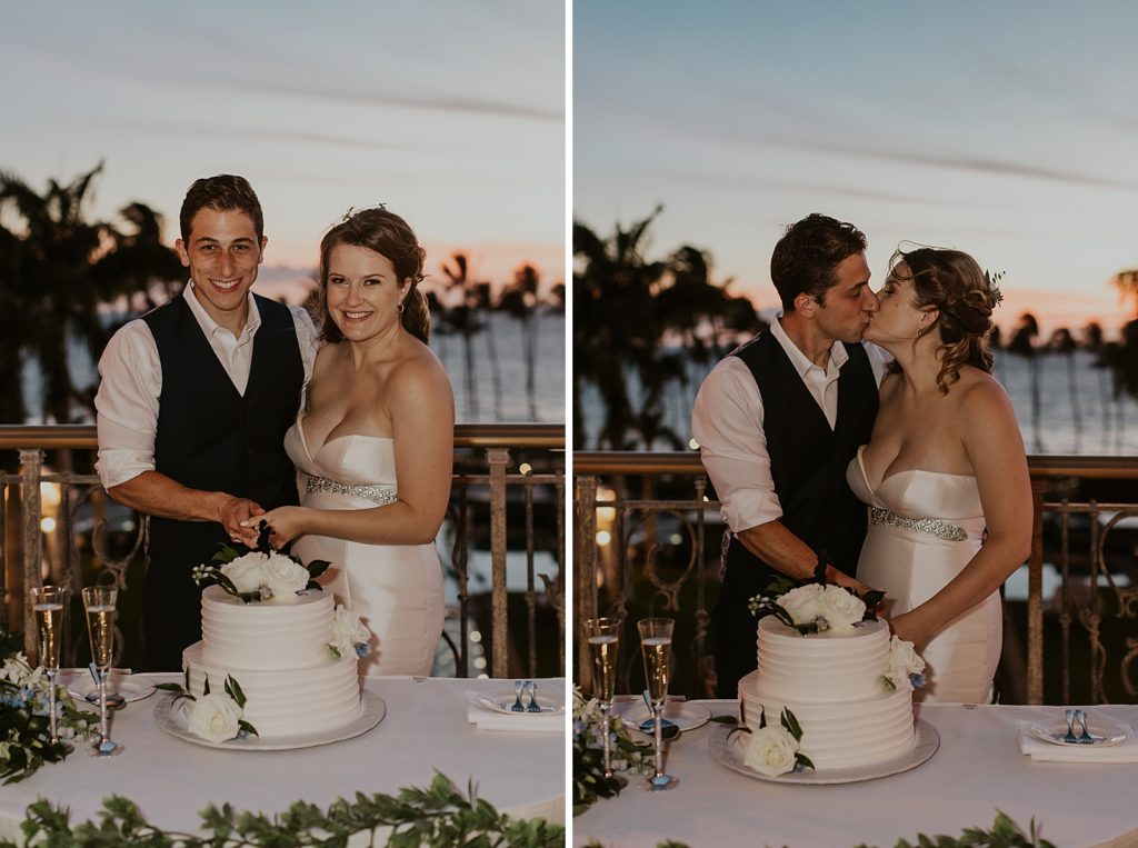 Bride and Groom cutting wedding cake together as sunsets