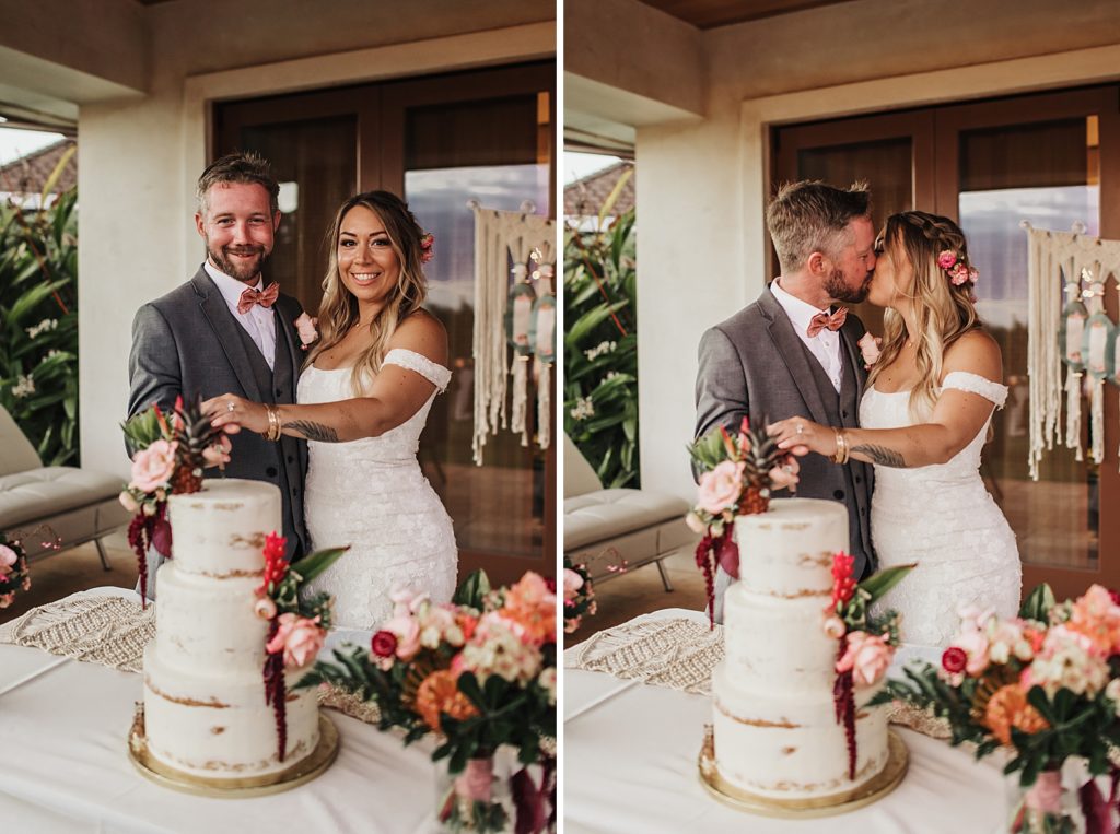 Bride and Groom holding each other close and about to cut wedding cake with floral decor
