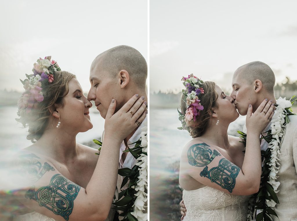 Closeup of Bride and Groom kissing by the oceanside