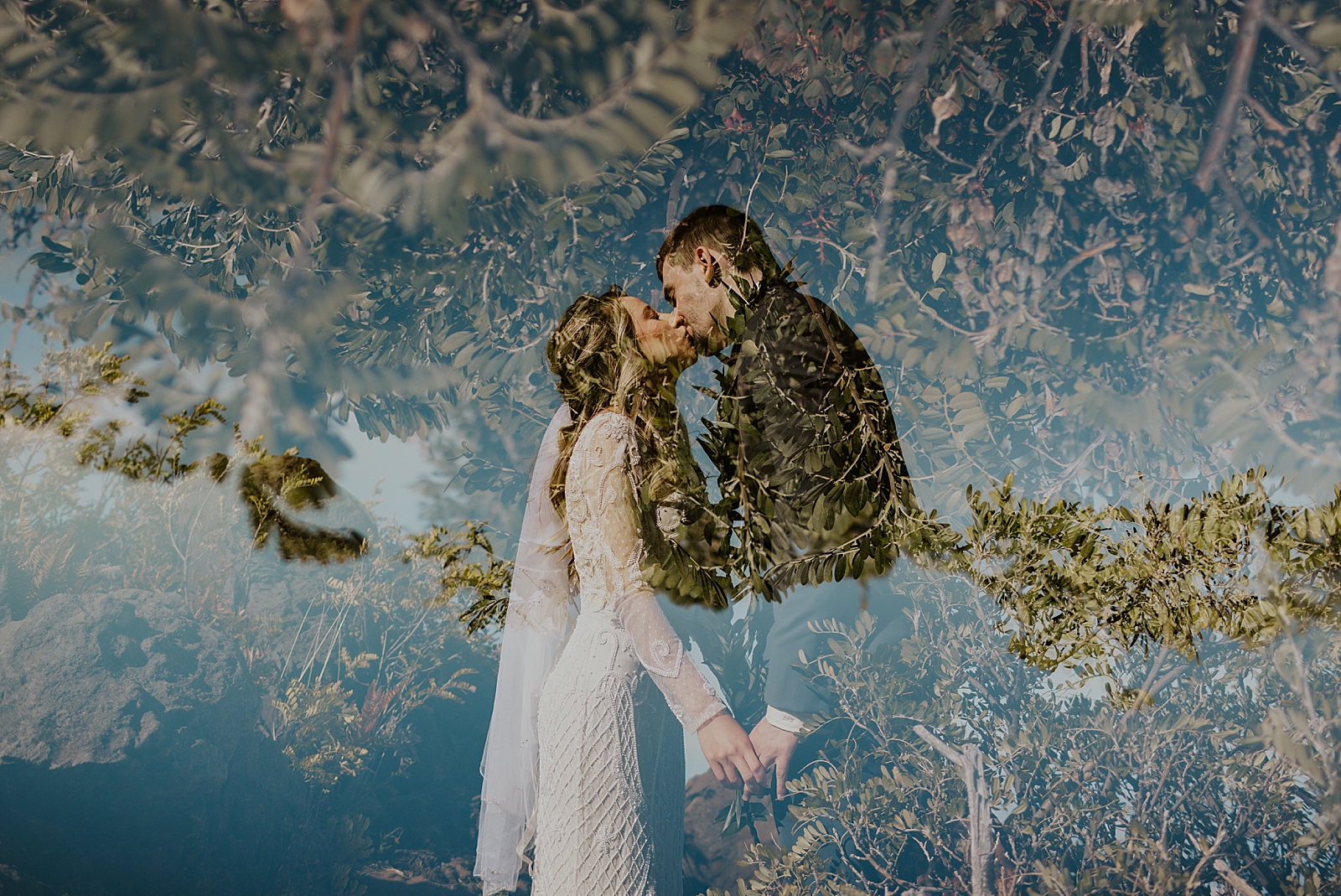 Bride and Groom kissing overlayed with detail shot of greenery