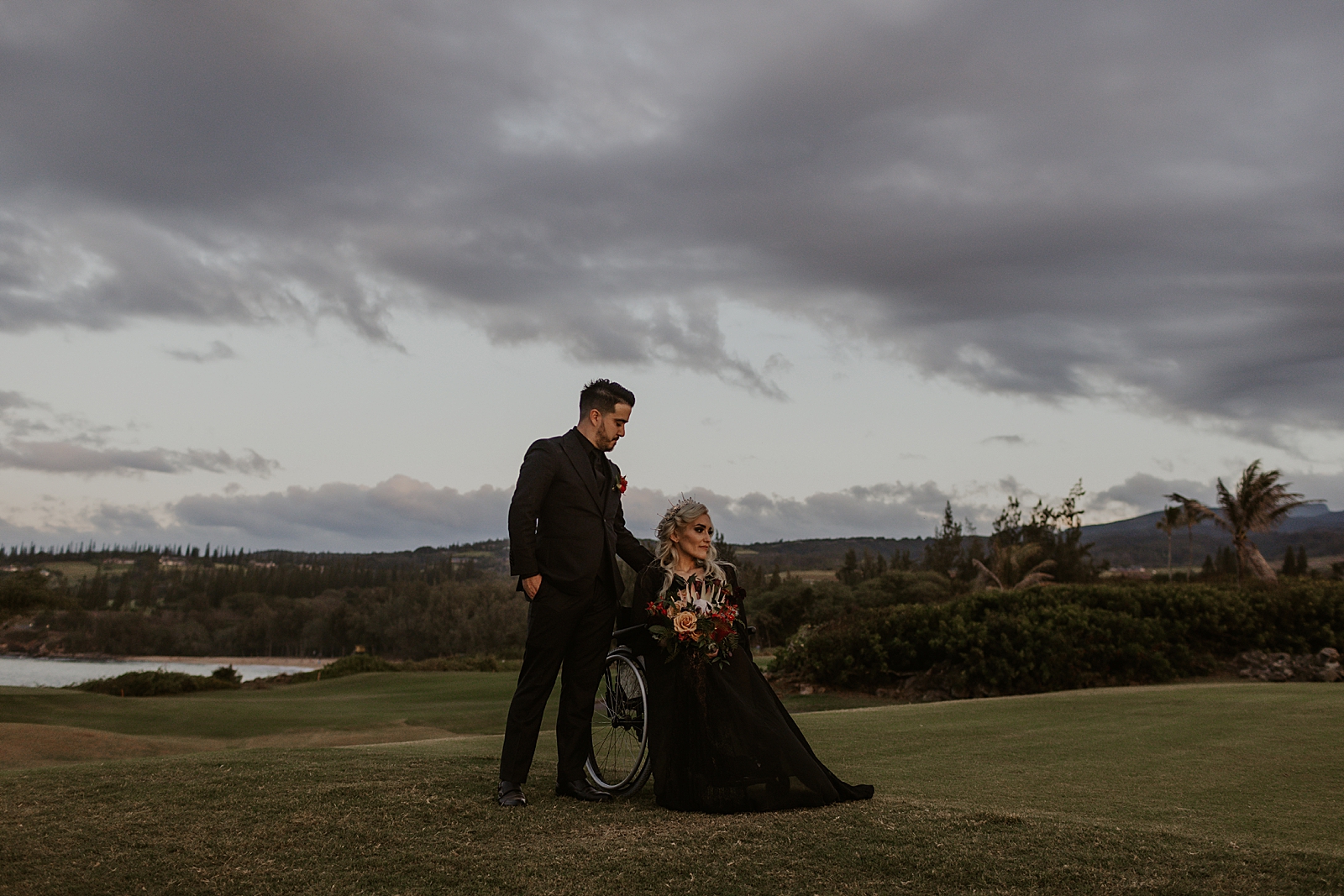 Bride and Groom portrait with overcast on green golf field