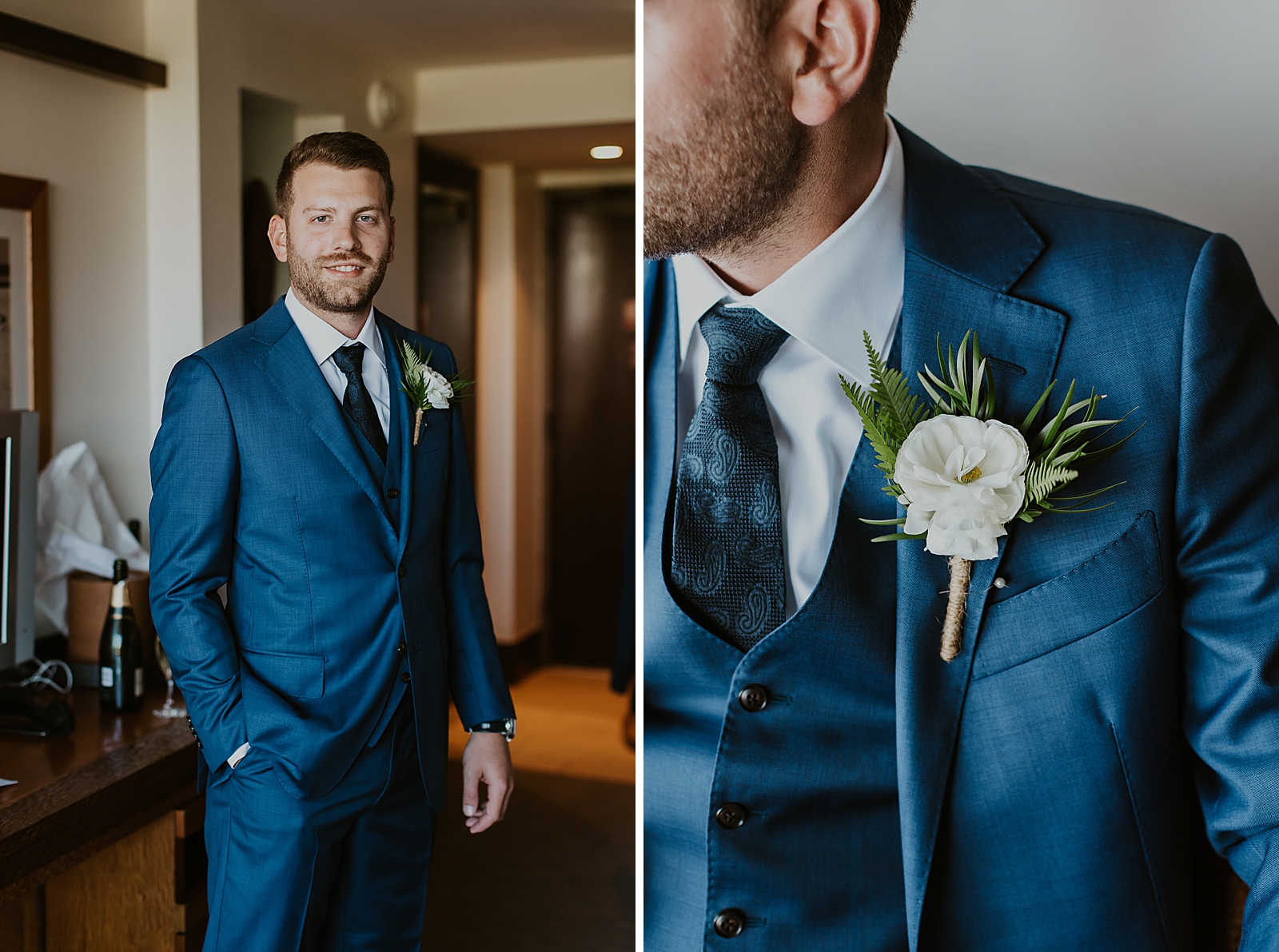 Groom after Getting Ready in Navy suit with white flower boutonniere 