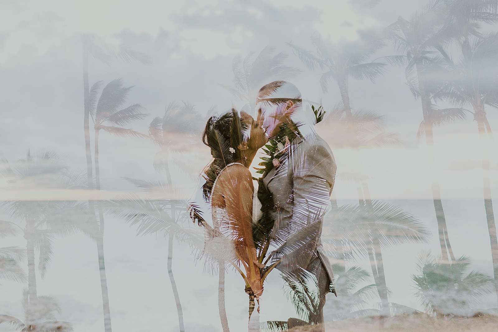 Bride and Groom kissing each other portrait overlayed on picture of tall palm trees