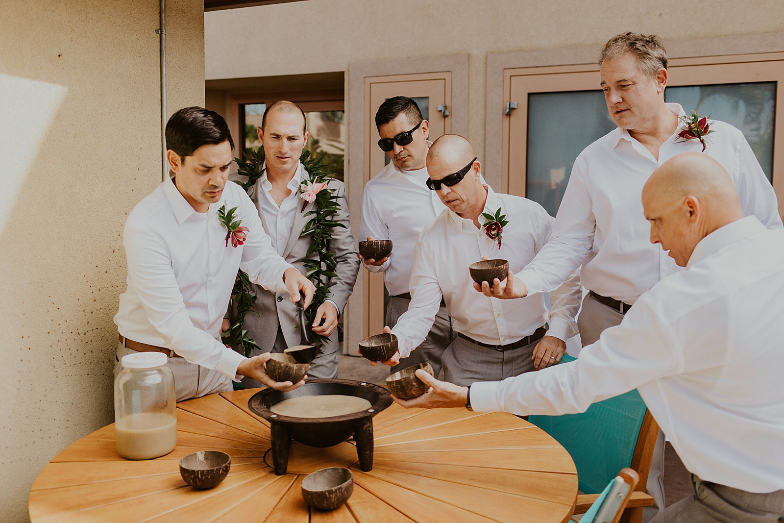 Groom and Groomsmen all having a traditional drink as they get ready